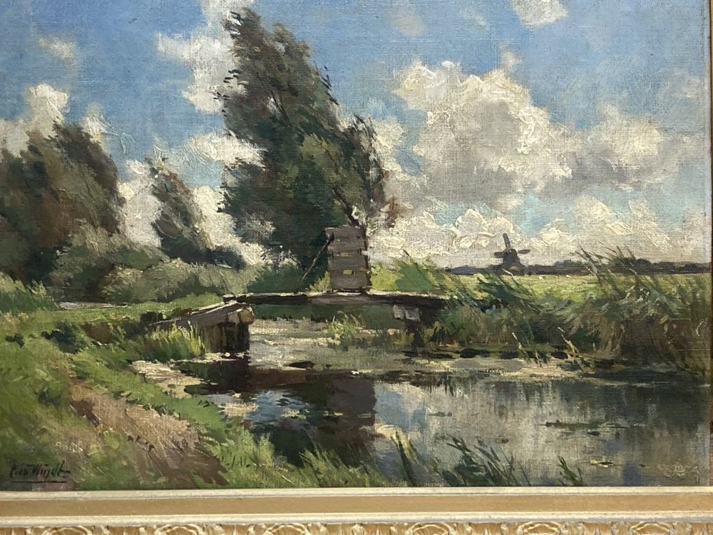 Chris van der Windt (Belgian 1877-1952), Dutch river landscape with a plank bridge and a distant windmill, 27 x 39cm